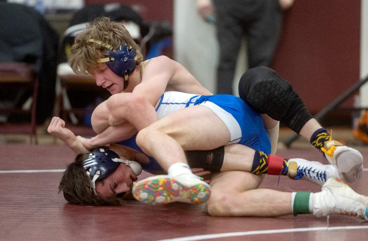 Bald Eagle Area’s Lucas Fye controls United’s Gideon Bracken in the 121 lb championship bout of the District 6 2A championships on Saturday, Feb. 18, 2023.