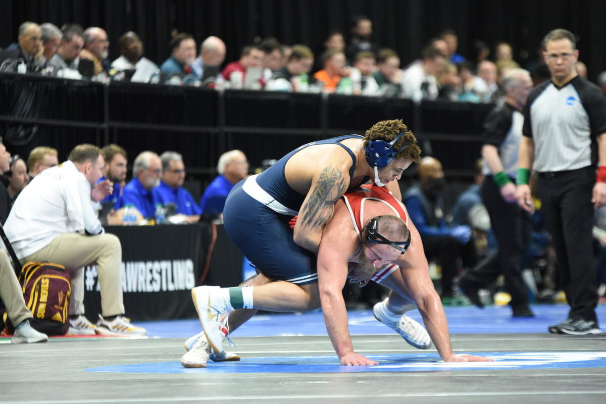 Penn State’s Greg Kerkvliet aims to keep Nebraska’s Christian Lance from escaping in their 285-pound quarterfinals match of the NCAA Championships on Friday, March 18, 2022 at Little Caesars Arena in Detroit. Kerkvliet made the semifinals with a 7-1 win.
