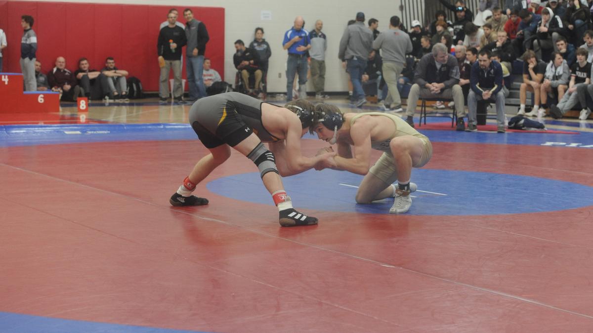 Bald Eagle Area’s Coen Bainey hand fights with Bentworth’s Chris Vargo in their 127-pound Ultimate Warrior finals match on Saturday, January 28, 2023. Vargo pinned Bainey in 3:50.