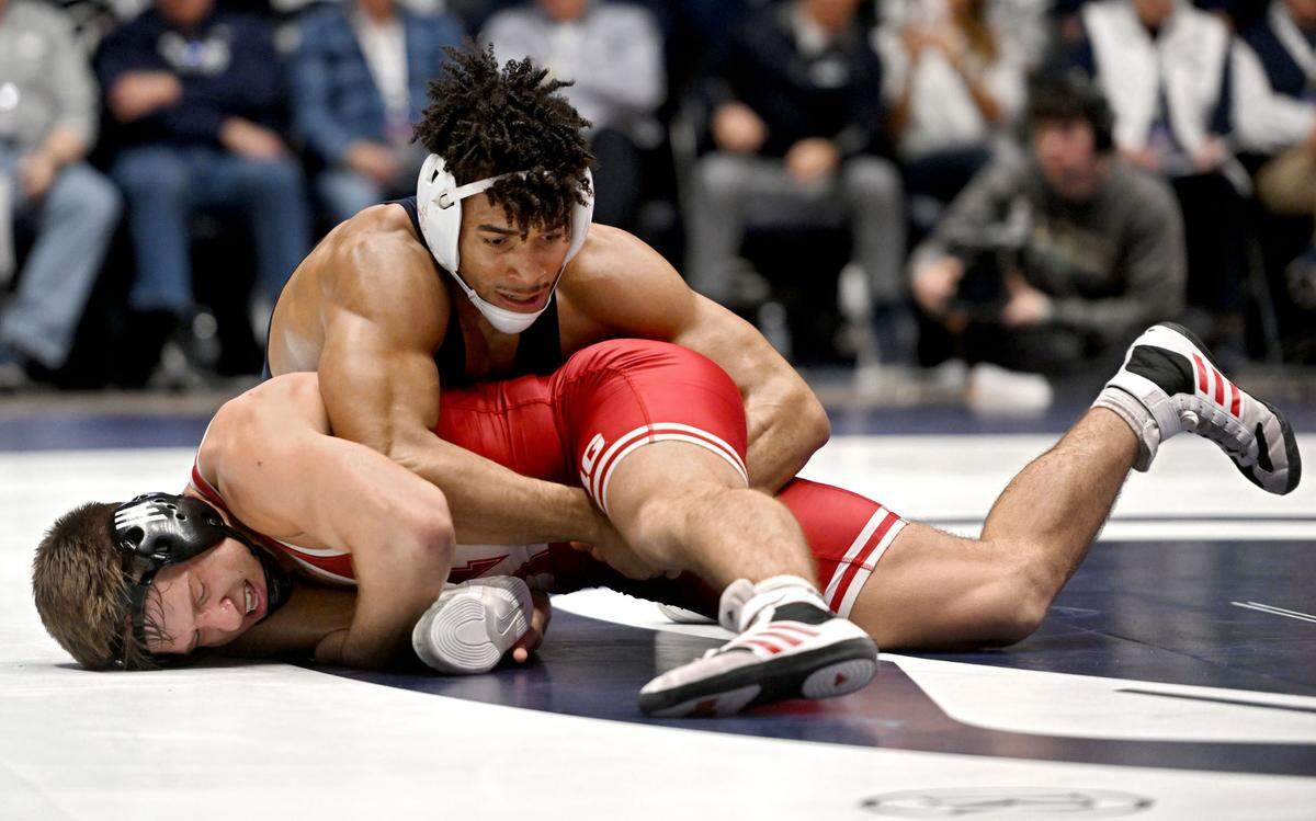 Penn State’s Carter Starocci controls Nebraska’s Bubba Wilson in the 174 lb bout of the match on Sunday, Feb. 18, 2024 in Rec Hall.