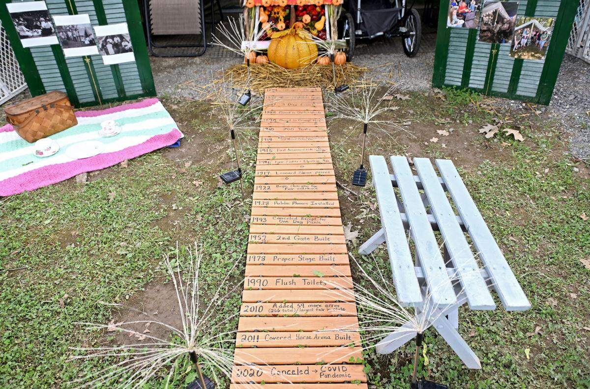 Sandy Mansfield decorated her family tent to honor the 150th anniversary of the Grange Fair.
