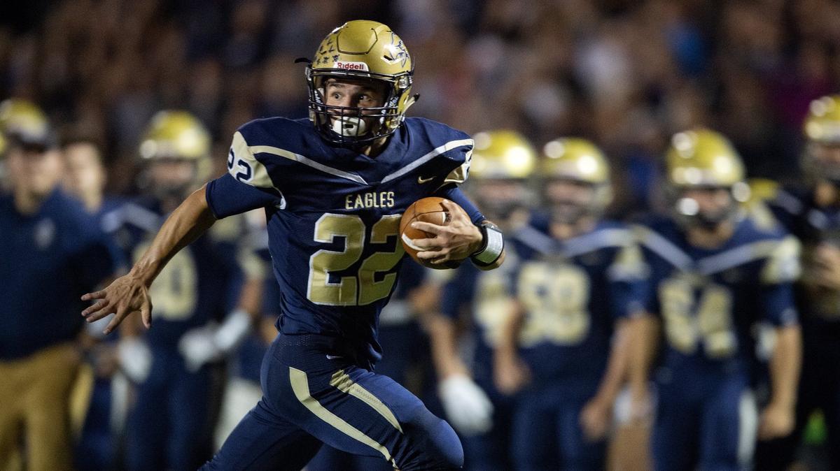 Bald Eagle Area’s Gage McClenahan runs for a touchdown against Tyrone.