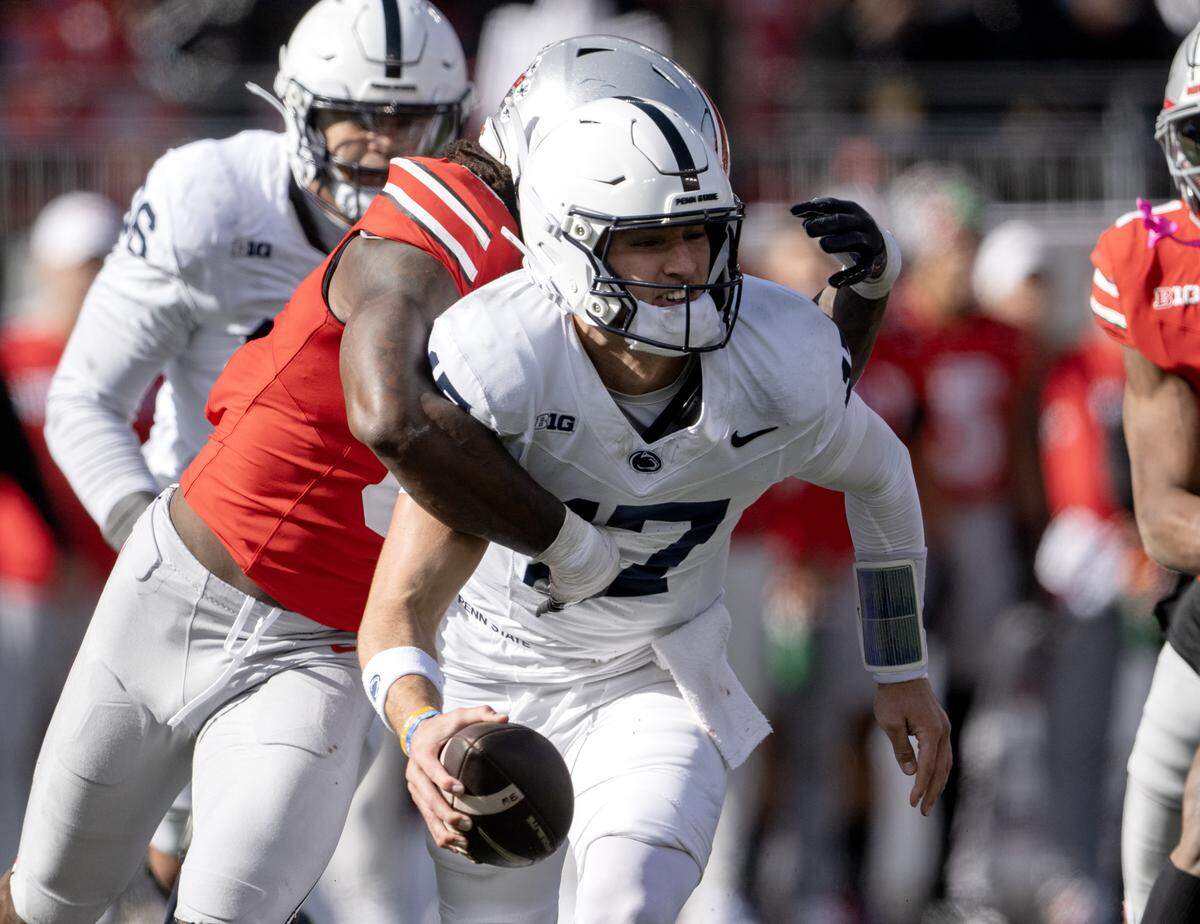 Penn State quarterback Ethan Grunkemeyer is sacked by Ohio State’s Arvell Reese during the game on Saturday, Nov. 1, 2025. 