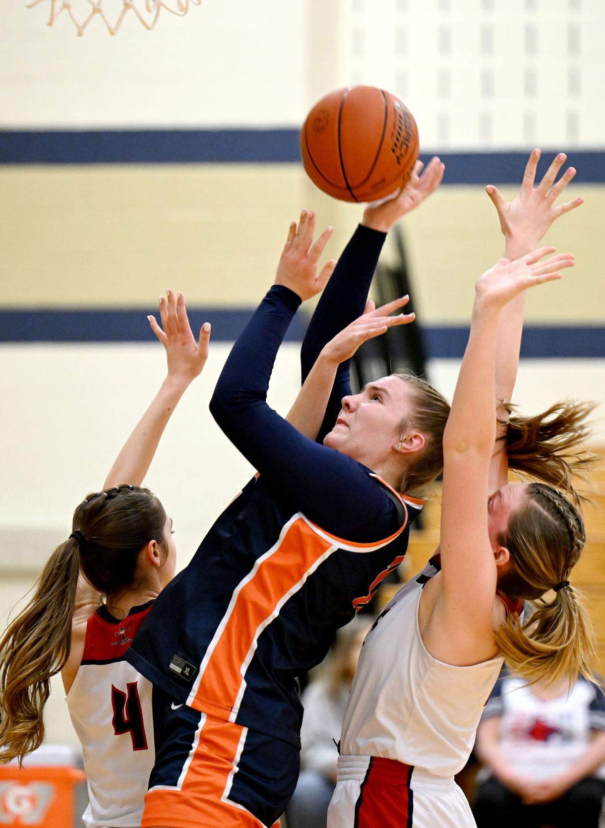 Saint Joseph’s Catholic Academy’s Aubrey Yartz takes a shot over DuBois Central Catholic defenders during the game on Wednesday, March, 12, 2025 at Bald Eagle Area High School.