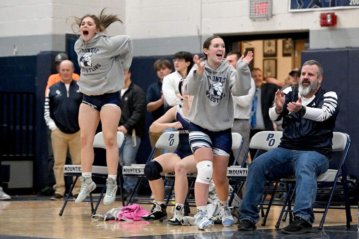Philipsburg-Osceola wrestlers celebrate their teammate Veda Kephart getting the win during the match against Bald Eagle Area on Tuesday, Jan. 7, 2025.