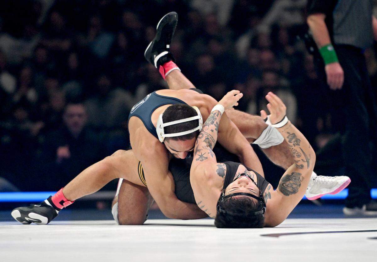 Penn State’s Shayne Van Ness controls Iowa’s Kyle Parco 149-pound bout of the match on Friday, Jan. 31, 2025 at the Bryce Jordan Center. Van Ness won by major decision 17-6.