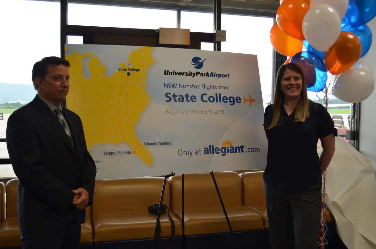 University Park Airport Director Bryan Rodgers with Allegiant Air Managing Director of Planning Kristen Schilling-Gonzales. Allegiant is adding service to two Florida destinations from University Park Airport starting in October.