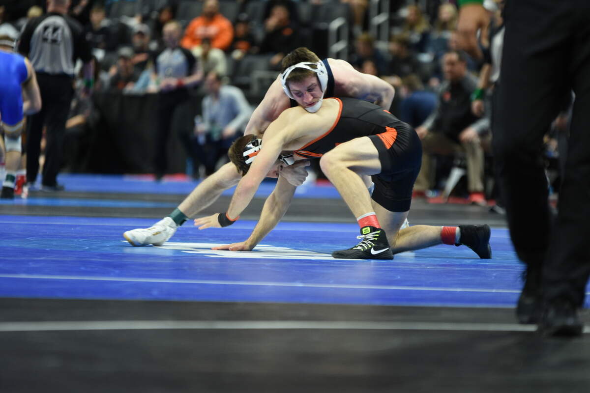 Penn State’s Nick Lee controls Oregon State’s Grant Willits during their 141-pound quarterfinals match of the NCAA Championships on Friday, March 18, 2022 at Little Caesars Arena in Detroit. Lee pinned Willits in 3:45.
