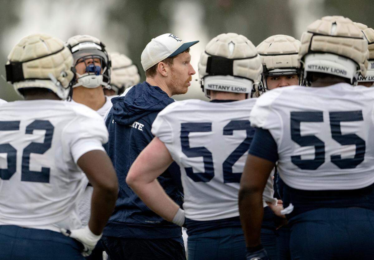Penn State offensive line coach Phil Trautwein talks to his players during practice on Friday, Dec. 30, 2022 for the Rose Bowl at Dignity Health Sports Park.