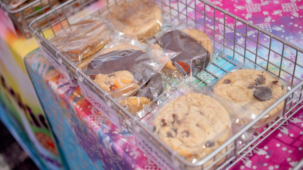 A sample of the cookies available from Inside Out Cookie, including cheesecake stuffed snickerdoodle and old school chocolate chip at the Pine Grove Mills Farmers Market on Thursday Aug. 25, 2022.