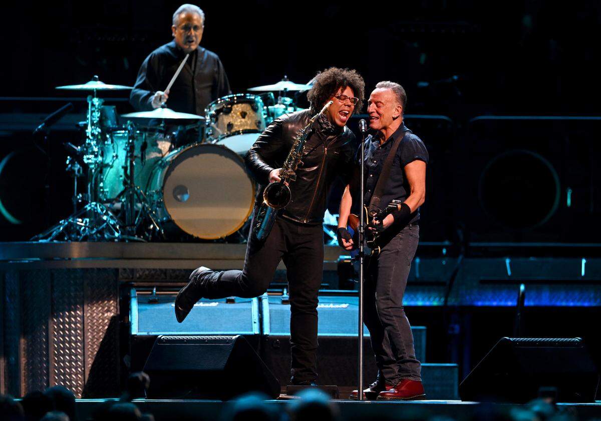 Jake Clemons and Bruce Springsteen share the mic during the show at the Bryce Jordan Center on Saturday, March 18, 2023.