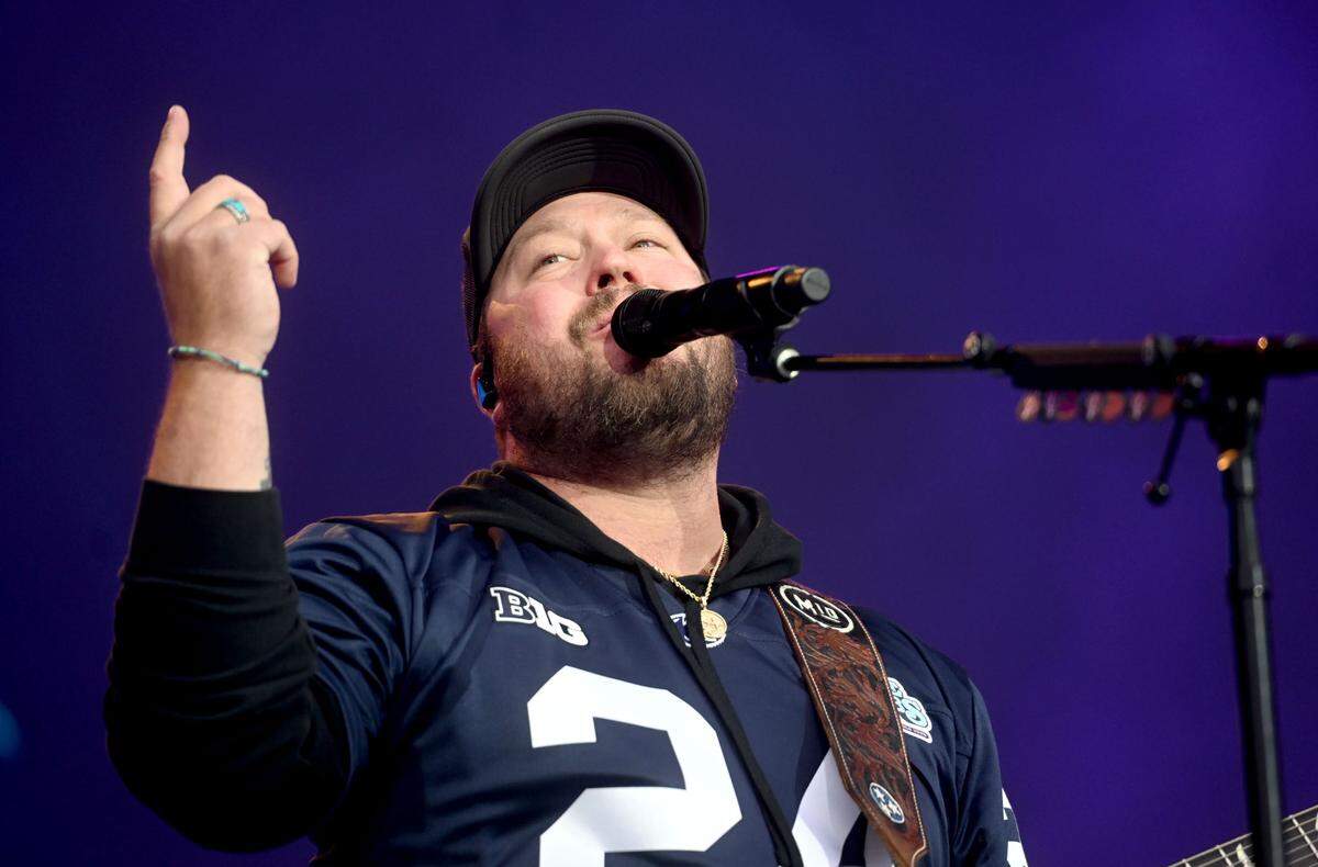 Wearing a Penn State jersey Mitchell Tenpenny performs at Beaver Stadium before Luke Combs on Saturday, April 27, 2024.