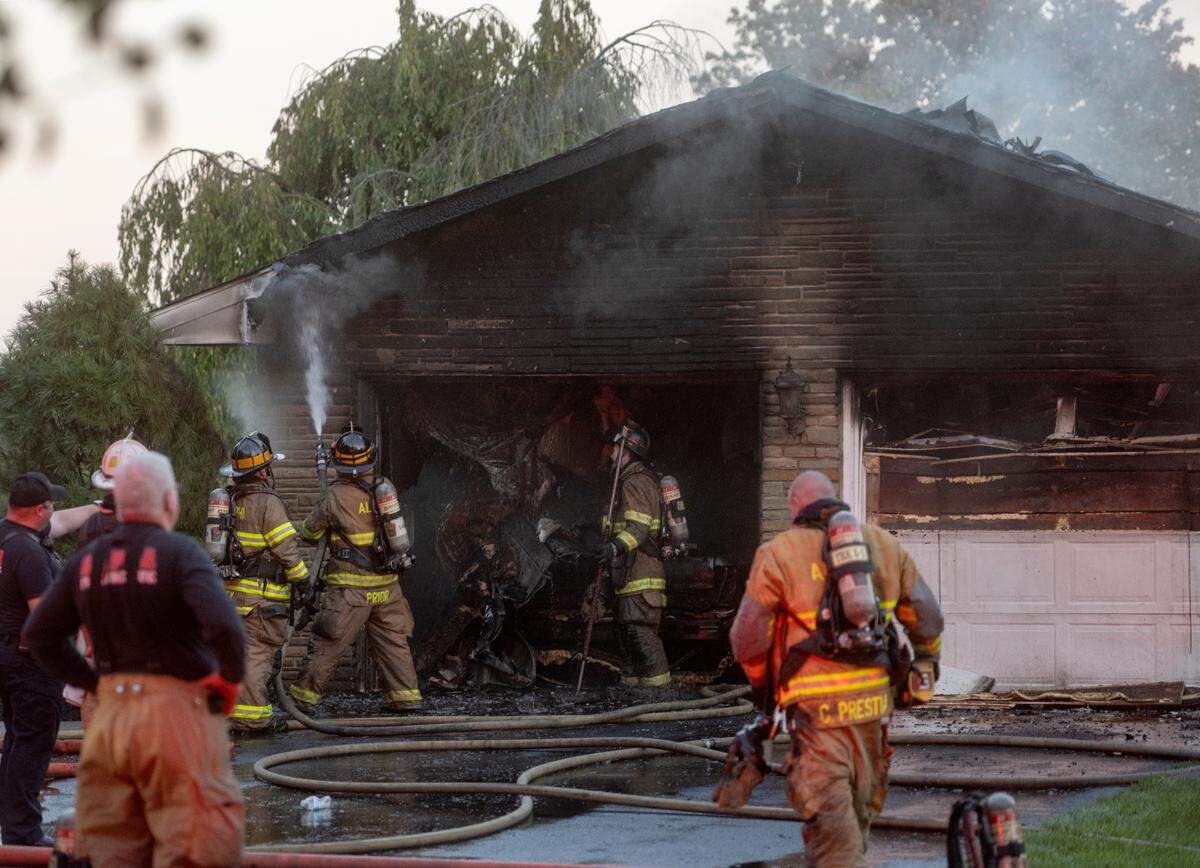 Centre County fire crews work on the scene of a house fire in the 900 block of Oak Ridge Avenue in College Township on Thursday, Sept. 21, 2023.