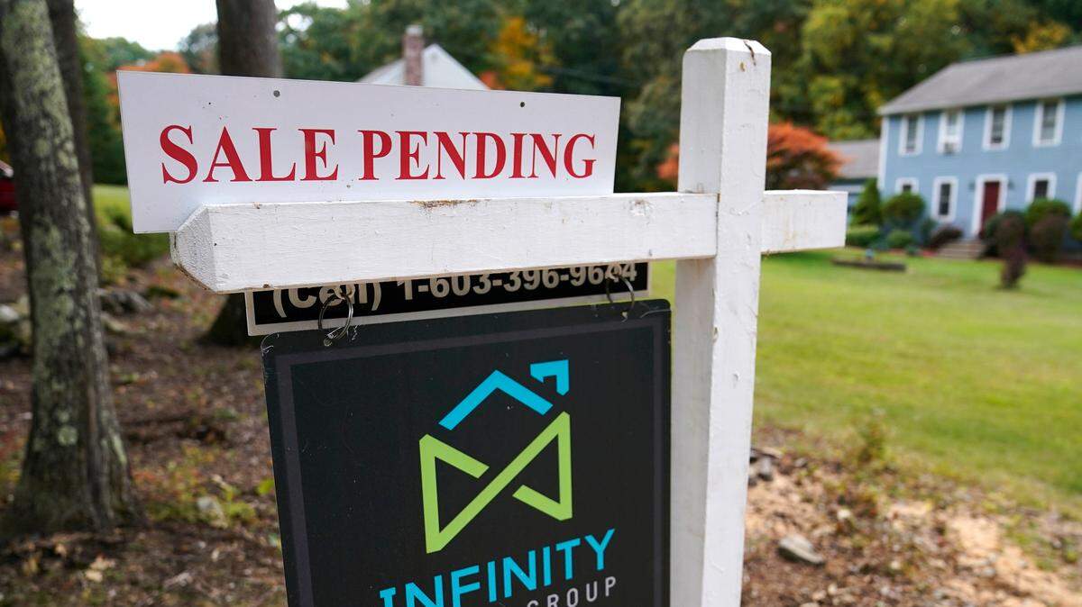 FILE - In this Sept. 29, 2020 file photo, a sale pending sign is displayed outside a residential home for sale in East Derry, N.H. (AP Photo/Charles Krupa, File)