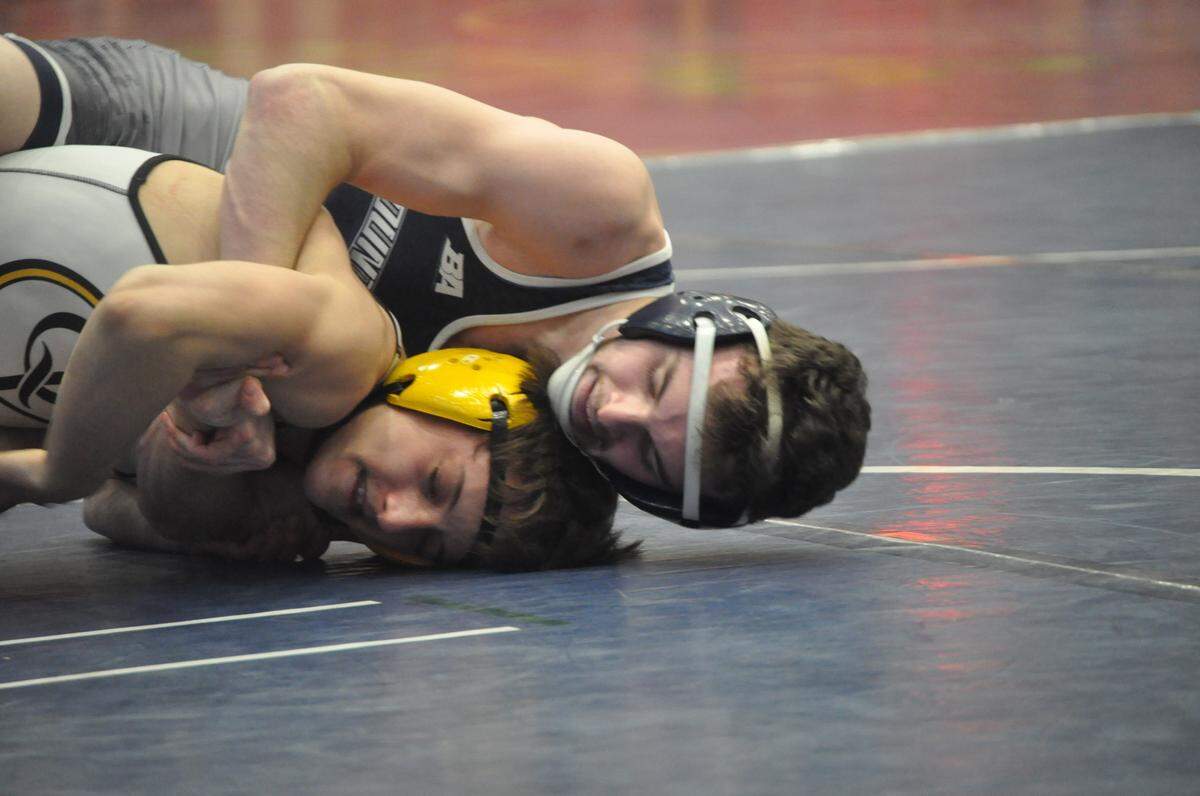 Philipsburg-Osceola’s Nick Coudriet tries to control Quaker Valley’s Logan Richey in their 120-pound first round bout of the PIAA Class AA Southwest Regional Friday, March 4, 2022.