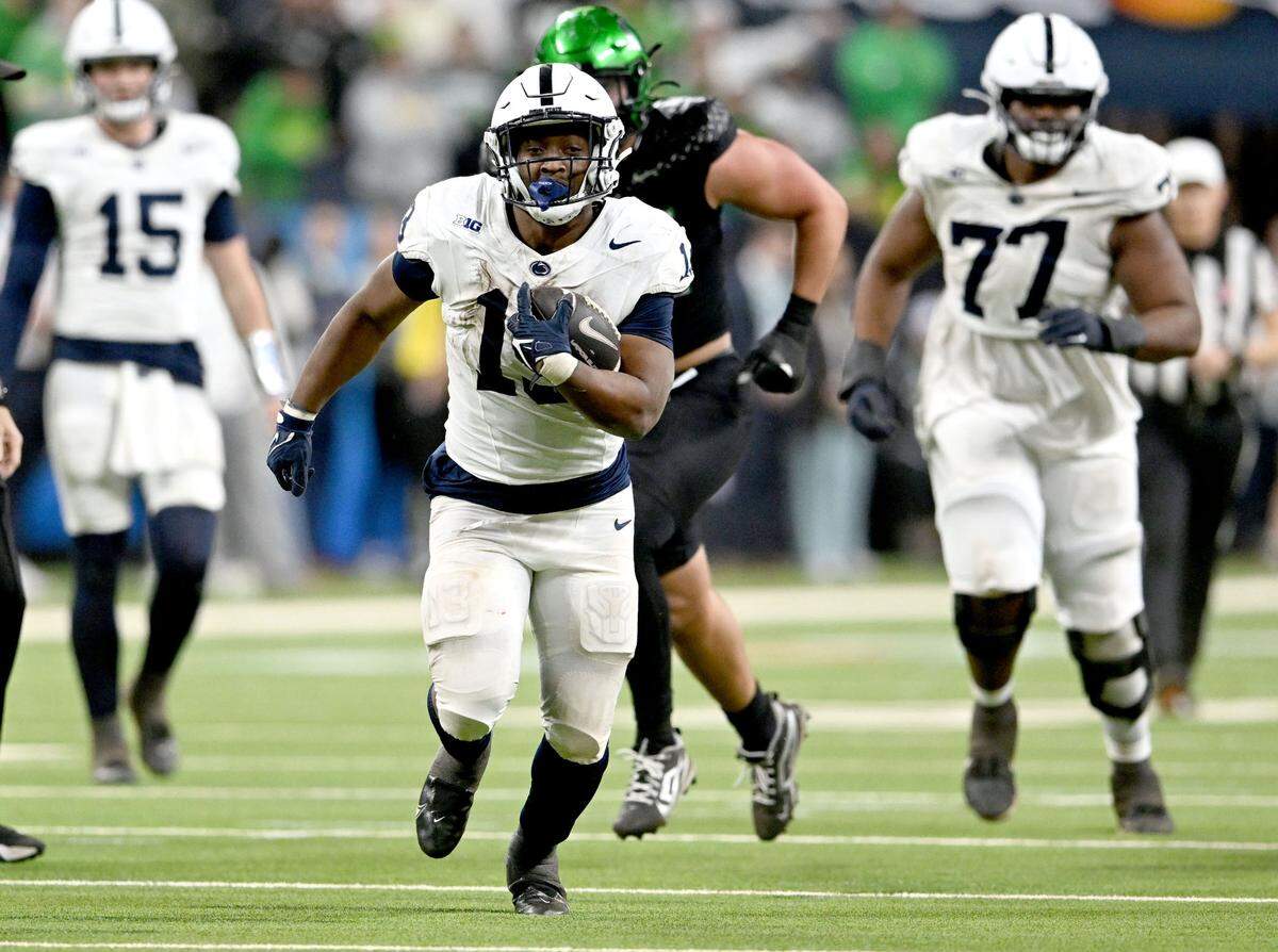 Penn State running back Kaytron Allen cuts down the field with the ball during the Big Ten Championship game against Oregon at Lucas Oil Stadium on Saturday, Dec. 7, 2024.  