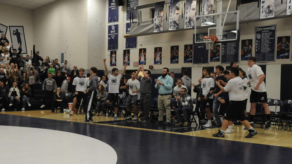 Philipsburg-Oscela wrestlers celebrate after Austin Foster’s pin sealed a 35-32 come-from-behind win over Bellefonte on Thursday.