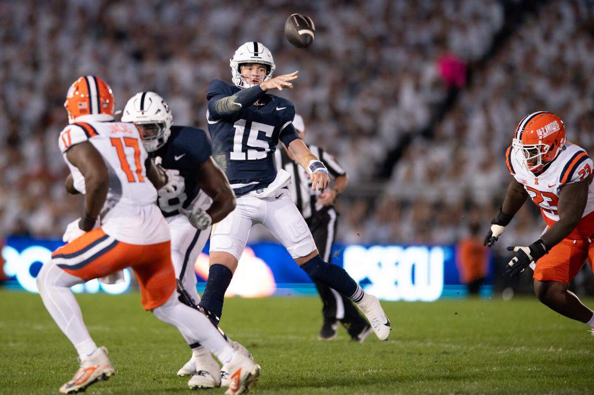 Penn State Nittany Lions quarterback Drew Allar (15) throws on the run during the football game against Illinois at Beaver Stadium on Saturday, Sept. 28, 2024. The Nittany Lions won 21-7.