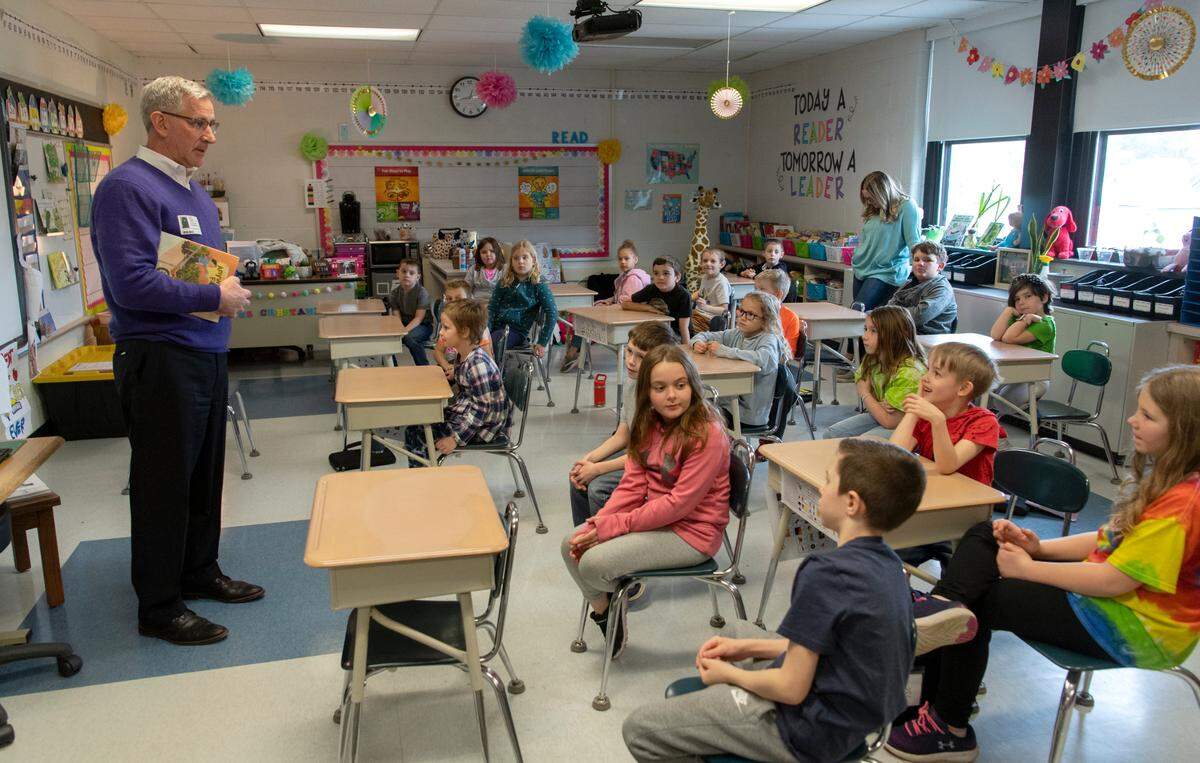Pennsylvania Agriculture Secretary Russell Redding talks to first and second grade students at Howard Elementary on Tuesday, March 15, 2022.