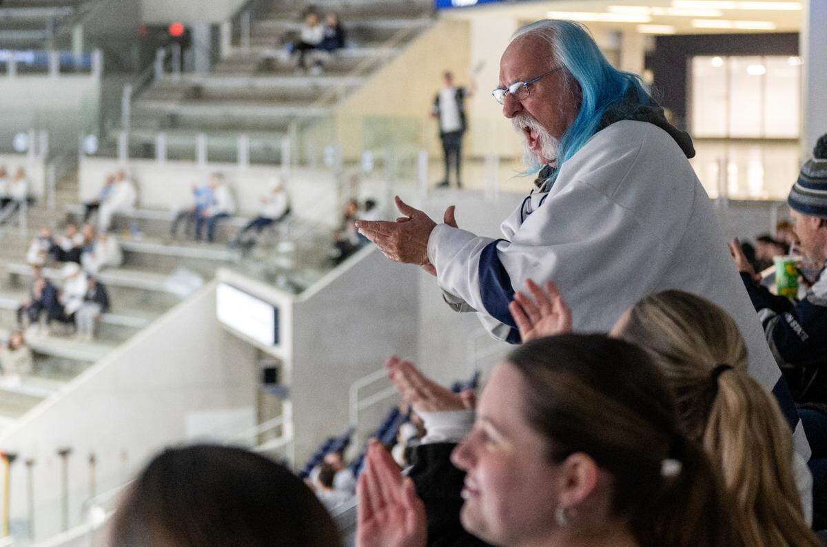 Rich Seifert leads a “We Are” chant during the NCAA Frozen Four watch party at Pegual Ice Arena on Thursday, April 10, 2025.