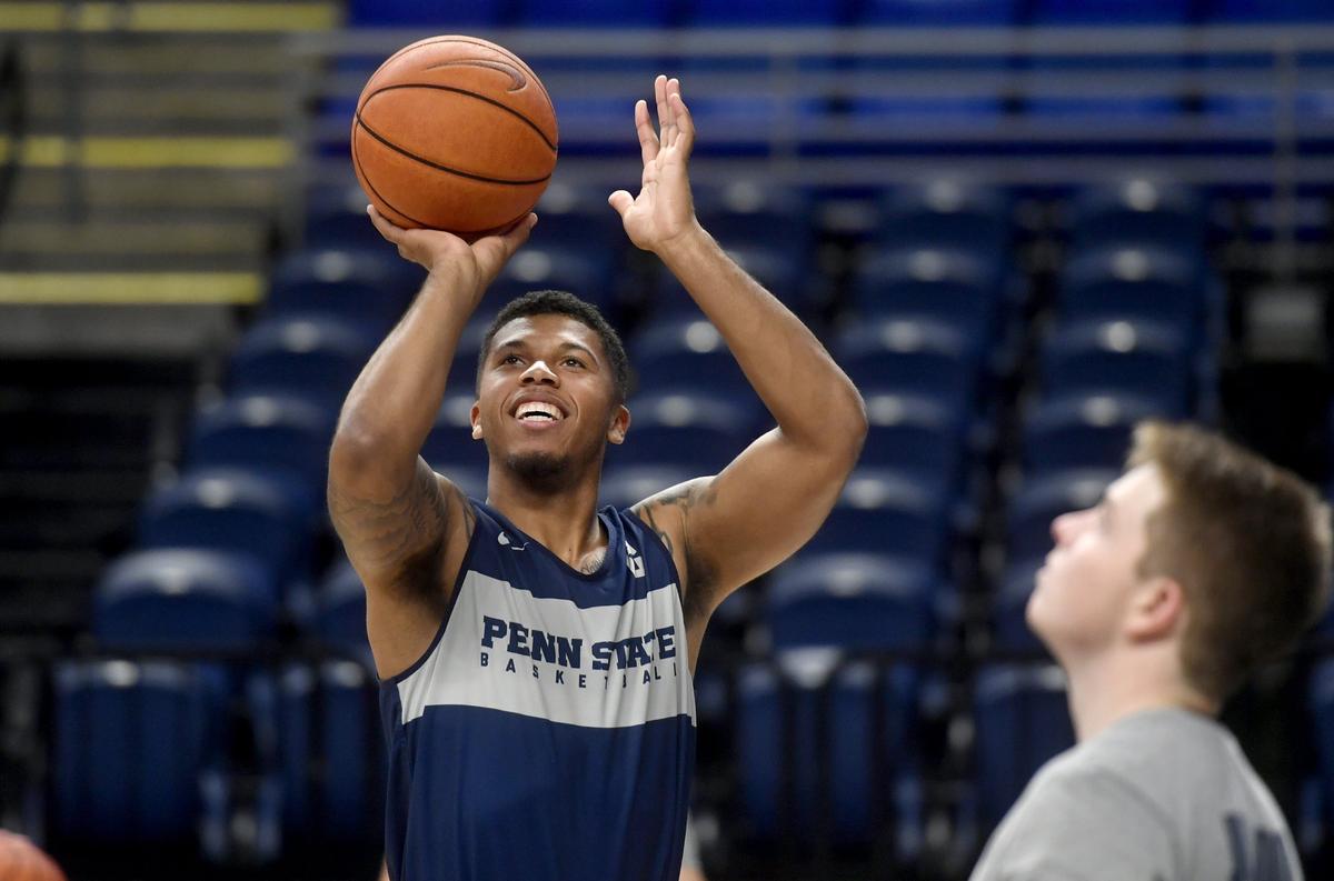 Penn State freshman guard Myles Dread laughs with teammates as he takes a shot during warmups for practice on Tuesday, Oct. 16, 2018.
