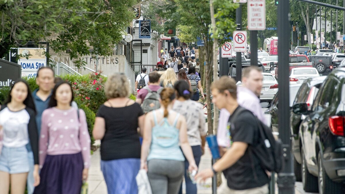 Penn State students fill the sidewalks of College Avenue in State College on the first day of classes on Monday, August 20, 2018.