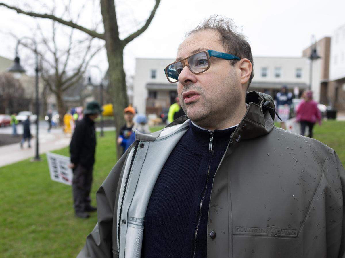 Joseph Haloua, a State College business owner, explains why he attended Saturday’s “Hands Off!” rally at State College’s Sidney Friedman Park, in opposition of President Donald Trump. The event was part of a nationwide effort that saw more than 1,000 similar rallies held across all 50 states.