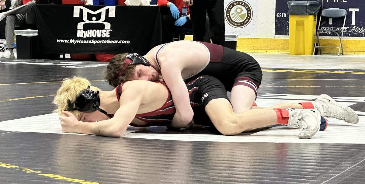 State College’s Noah Young controls Boyertown’s Liam Vance in their 114-pound bout on Saturday, Feb. 7, 2026 in 1st Summit Arena in Johnstown at the consolation quarterfinals of the PIAA Class 3A Team Wrestling Championships. Young pinned Vance in 2:47, but the Little Lions lost overall 29-27.