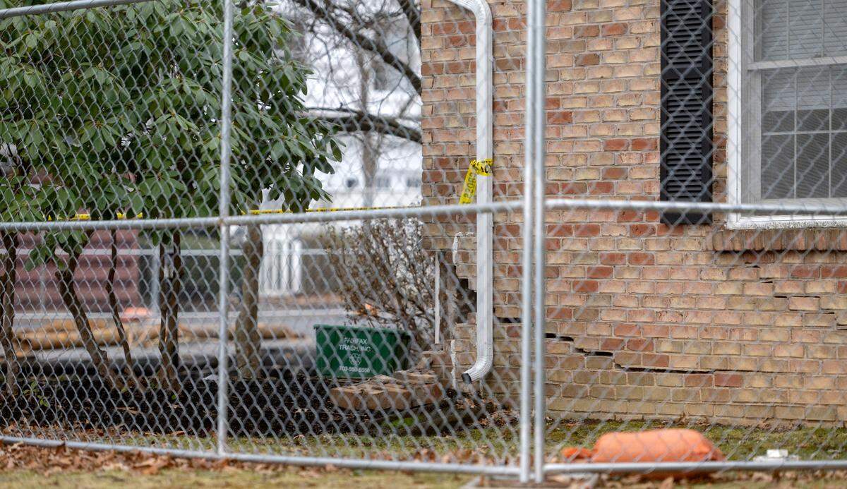 Bricks have fallen and a large crack at one of the townhouses on Amblewood Way in Patton Township on Friday, Jan. 6, 2023.