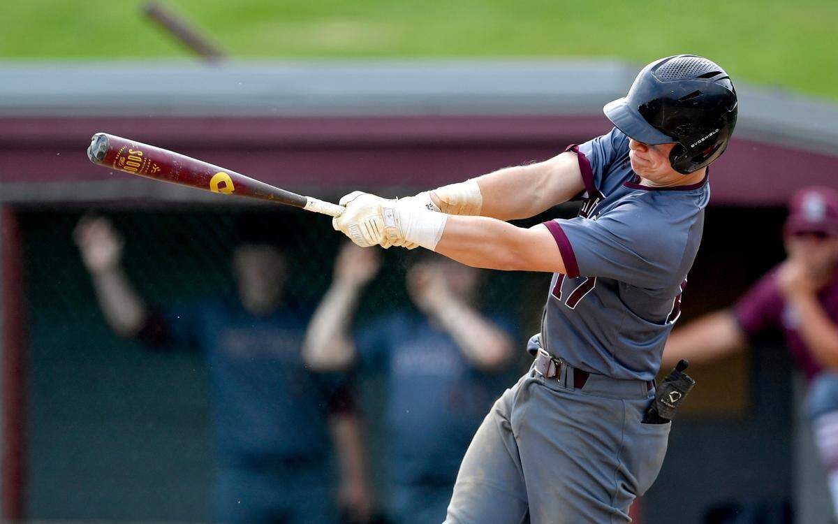 State College’s Ethan Schimony hits a double that scores three runs in the bottom of the fourth inning of the District 6 semifinal game against Altoona on Tuesday, May 25, 2021.