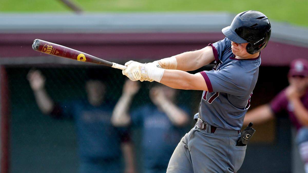 State College’s Ethan Schimony hits a double that scores three runs in the bottom of the fourth inning of the District 6 semifinal game against Altoona on Tuesday, May 25, 2021.