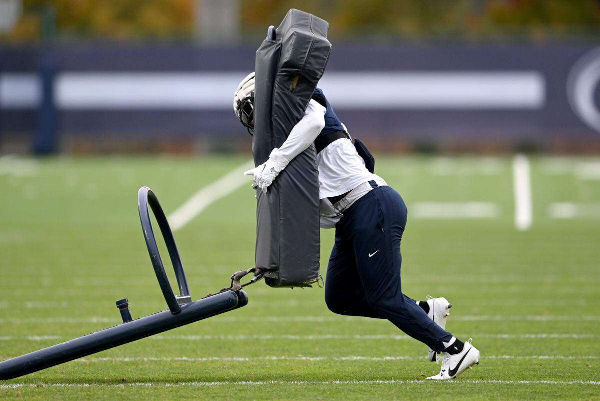 Penn State linebacker Curtis Jacobs runs a drill during practice on Wednesday, Oct. 18, 2023.