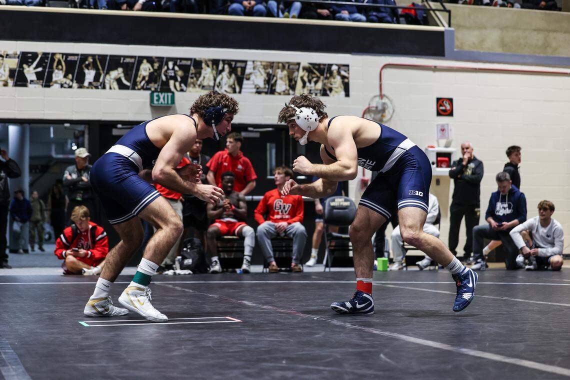 Penn State’s Levi Haines, right, and teammate William Henckel looking for a shot attempt in their 174-pound finals match of the Black Knight Invitational on Sunday, Nov. 23, 2025 in West Point, NY. Haines shut out Henckel, 4-0.