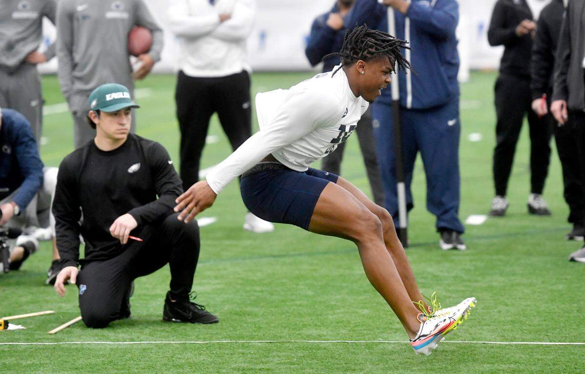 Safety Ji’Ayir Brown does the broad jump during Penn State football’s Pro Day on Friday, March 24, 2023.