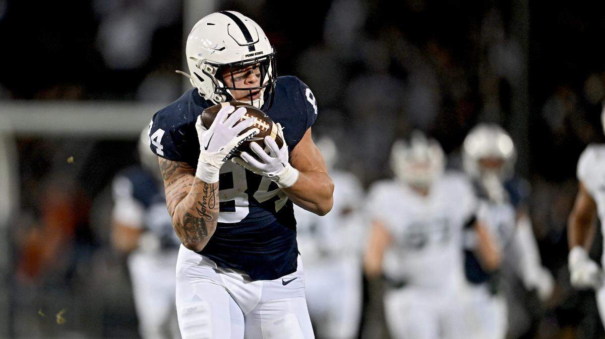 Penn State tight end Theo Johnson makes a catch and runs it in for a touchdown during the second quarter of the game against Michigan State on Nov. 26, 2022.