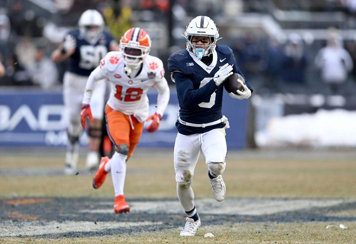 Penn State wide receiver Trebor Pea evades Clemson defenders to run for a touchdown during the Pinstripe Bowl at Yankee Stadium on Saturday, Dec. 27, 2025.