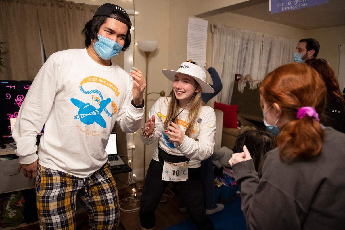 Anton Aluquin, left, and Samantha Calus dance during the first day of Thon Friday in State College. Dancers are participating in the annual event, which raises money for the Four Diamonds childhood cancer charity, remotely this year due to the pandemic.