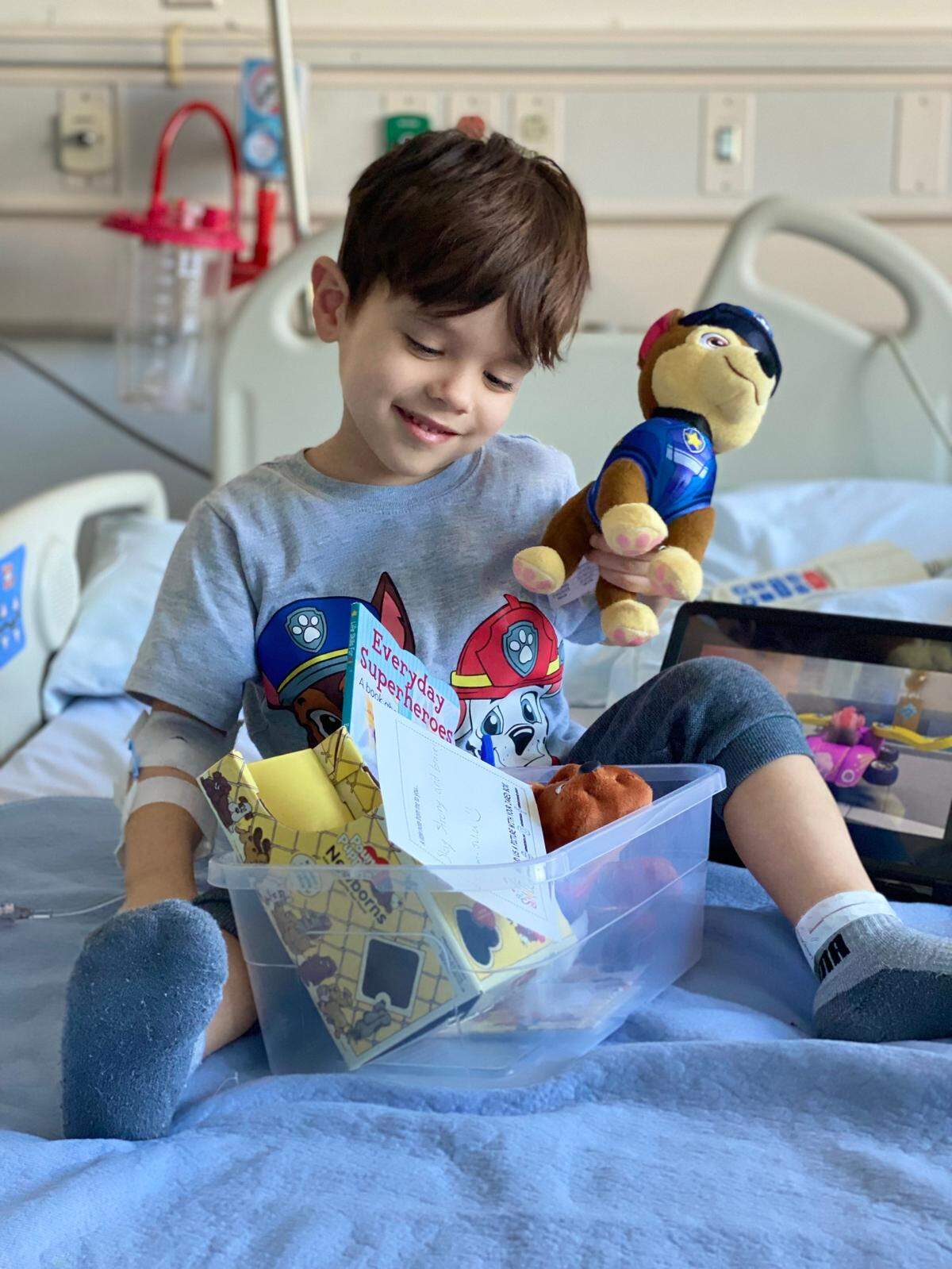 A child receives a Jared Box.