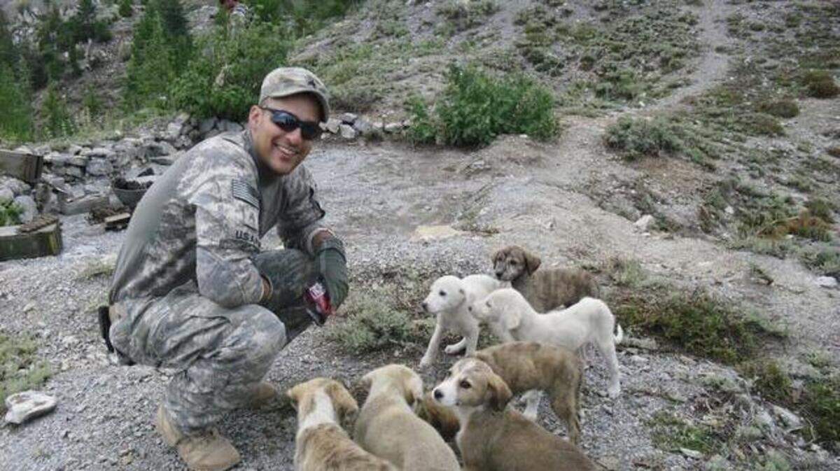 U.S. Army Sgt. Steven DeLuzio, 25, enjoys downtime during his 2010 combat deployment to Afghanistan. The soldier was killed in action in August 2010 during a fierce battle with enemy forces.
