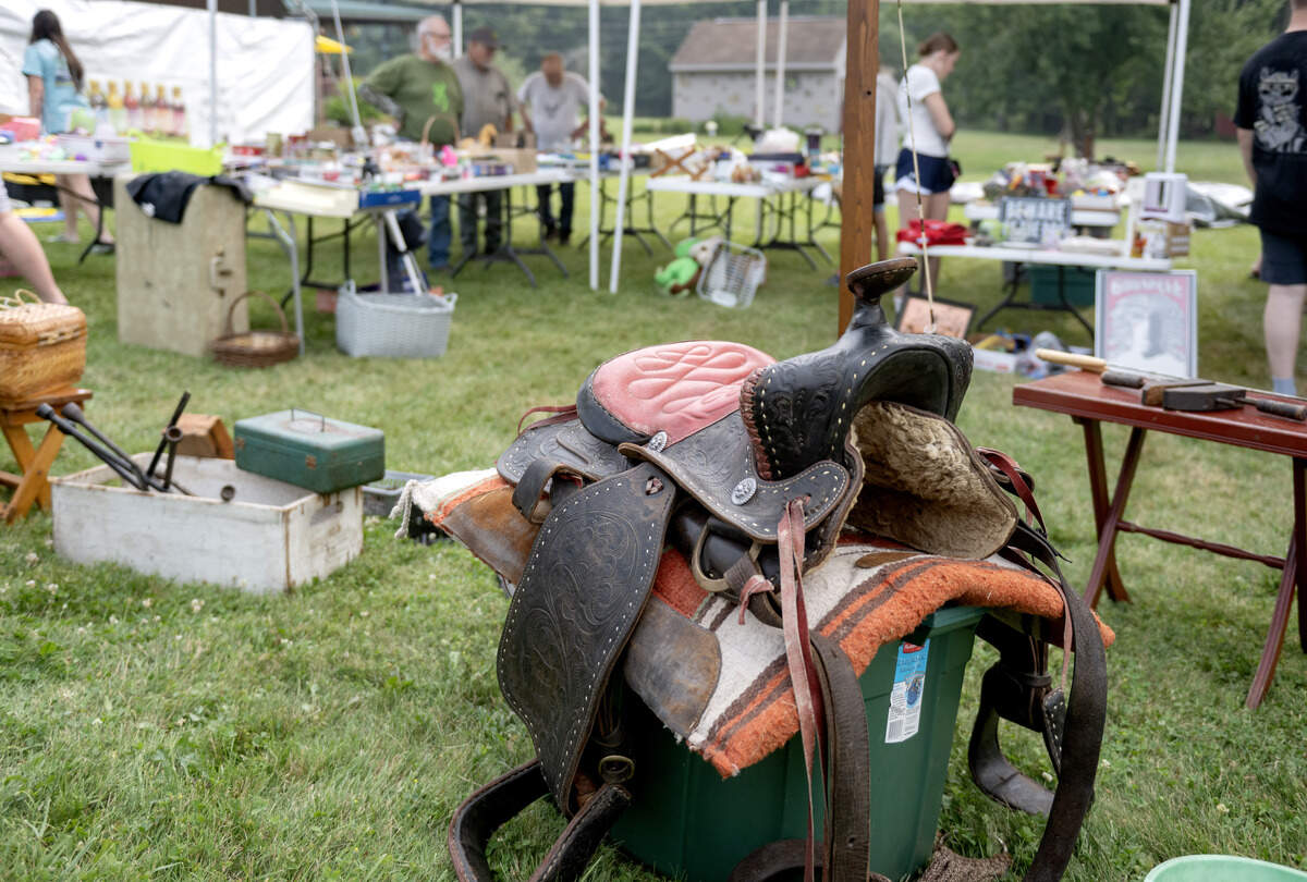 A horse saddle for sale at Sherie and Kim’s Windy Hill Uniques stand in Pine Glen during the 100 Mile Yard Sale on Friday, July 17, 2026.