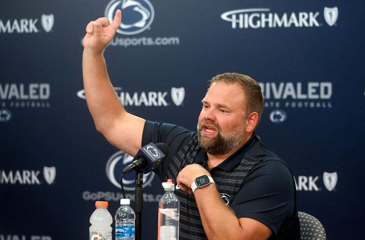 Penn State offensive coordinator Andy Kotelnicki answers a question about using in-helmet radios during media day on Saturday, Aug. 3, 2024.