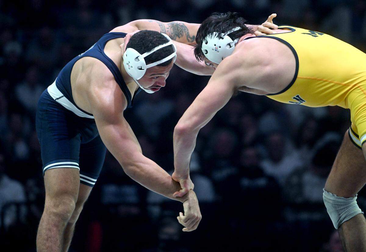Penn State’s Aaron Brooks wrestles Michigan’s Matt Finesilner in the 184 lb bout of the match on Friday, Jan. 20, 2023 at the Bryce Jordan Center.