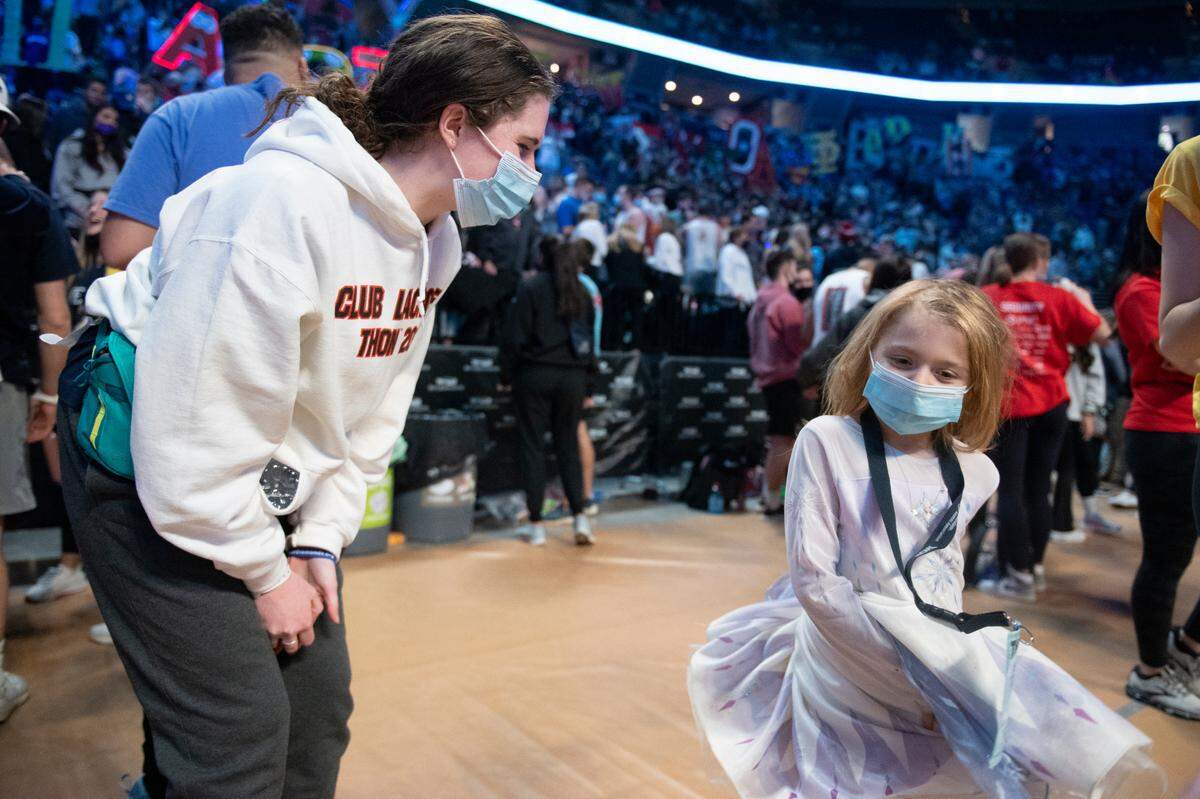 Kennedy Wilson talks with Abigail Higgins during the Penn State IFC/Panhellenic Dance Marathon, Thon 2022 on Saturday, Feb. 19, 2022 in University Park, Pa.