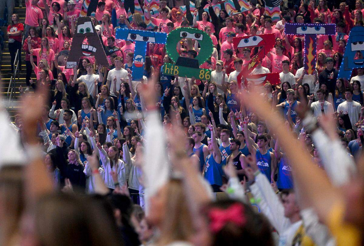 Dancers and organizations in the stands learn the line dance in the first hour of the Penn State IFC/Panhellenic Dance Marathon on Friday, Feb. 17, 2023 at the Bryce Jordan Center.