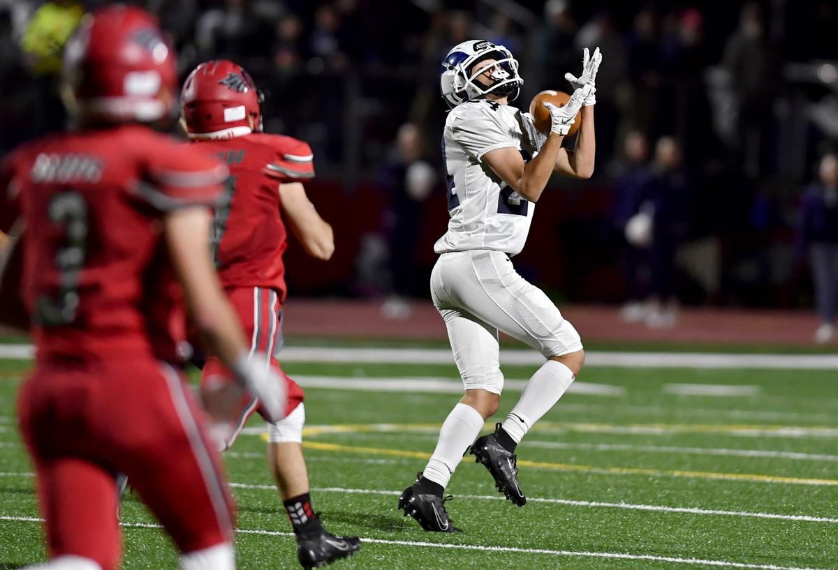 Penns Valley’s Stephen Ripka makes a catch ahead of Bellefonte defenders during the game on Friday, Oct. 4, 2019.