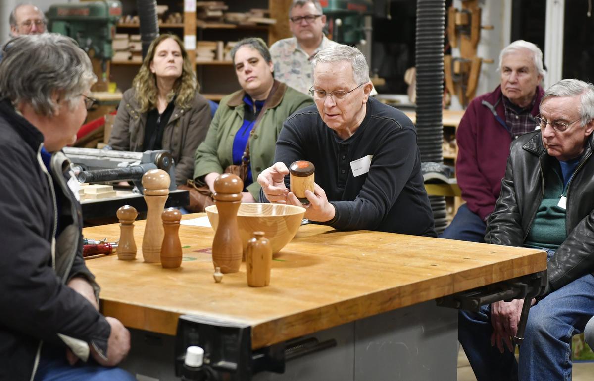 Mike Lebo shares a box he turned during the Nittany Valley Woodturner’s Club monthly meeting in March. Each month, members are invited to bring projects they have worked on to share with the group.