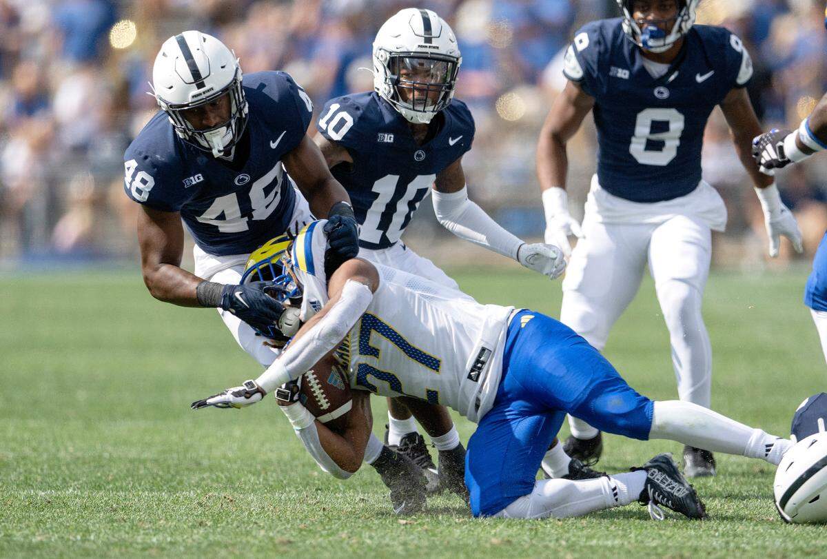 Penn State linebacker Kaveion Keys stops Delaware’s Jo’Nathan Silver during the game on Saturday, Sept. 9, 2023.