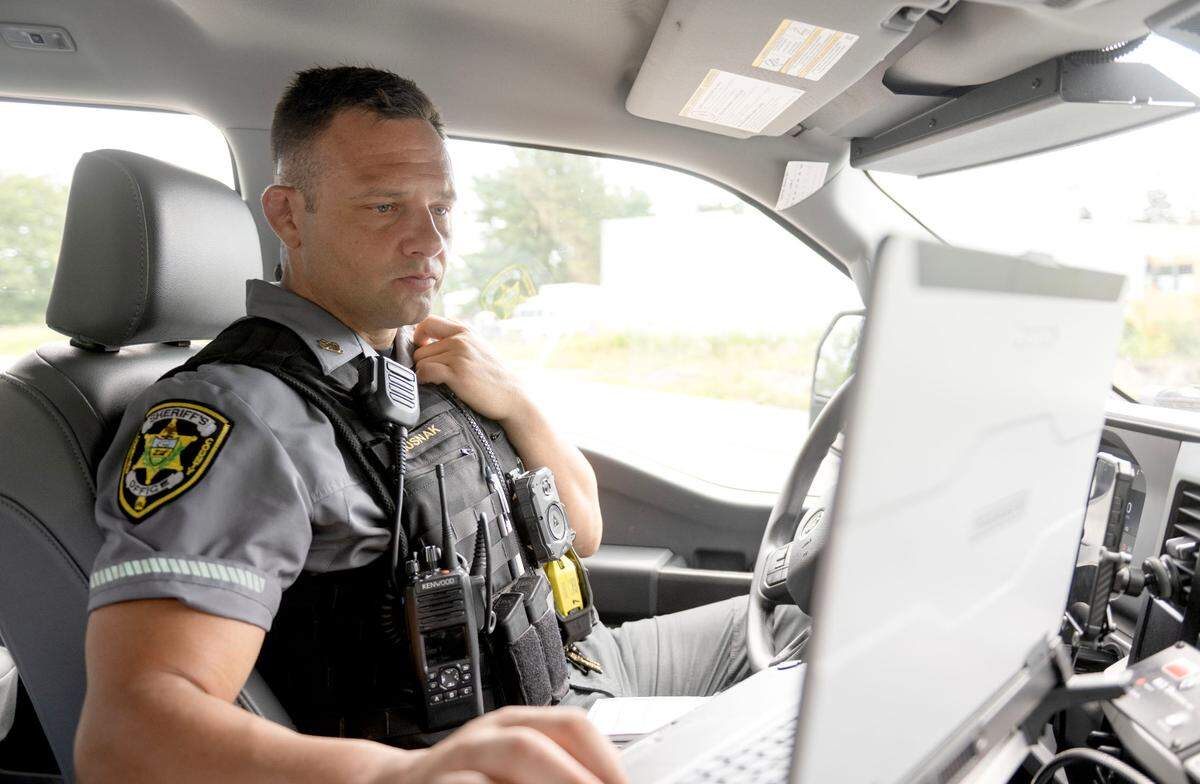 Centre County humane officer Mark Rusnak checks his laptop as he investigates a call about animal neglect on Monday July 7, 2025.