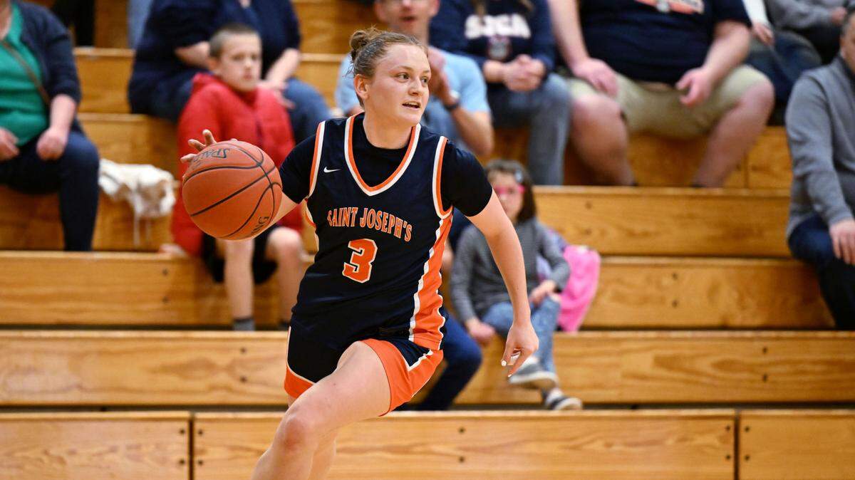 St. Joseph’s Catholic Academy’s Naomi Crispin, seen here from Wednesday’s second-round game, finished with a game-high 25 points Saturday in the PIAA Class A quarterfinals against Bishop Guilfoyle in Altoona. SJCA lost 66-48.