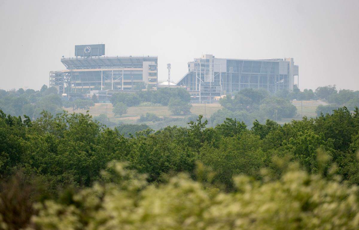 Beaver Stadium through smoky skies from Walker Drive on Wednesday, June 7, 2023.